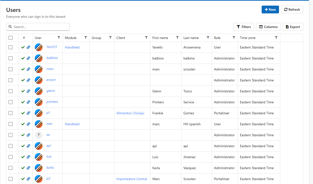 The Users list with each user's status, module, client, name, role and time zone