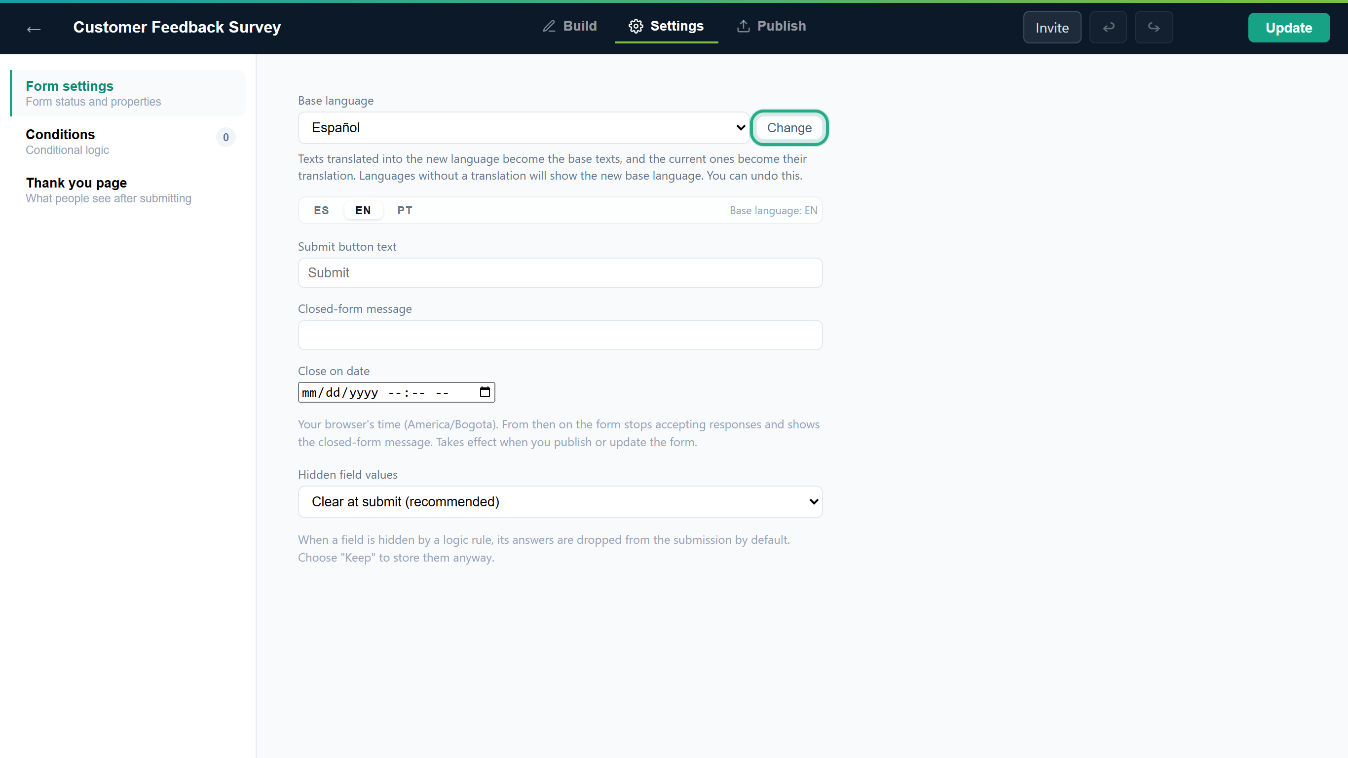 The Change button outlined, next to Base language set to Español